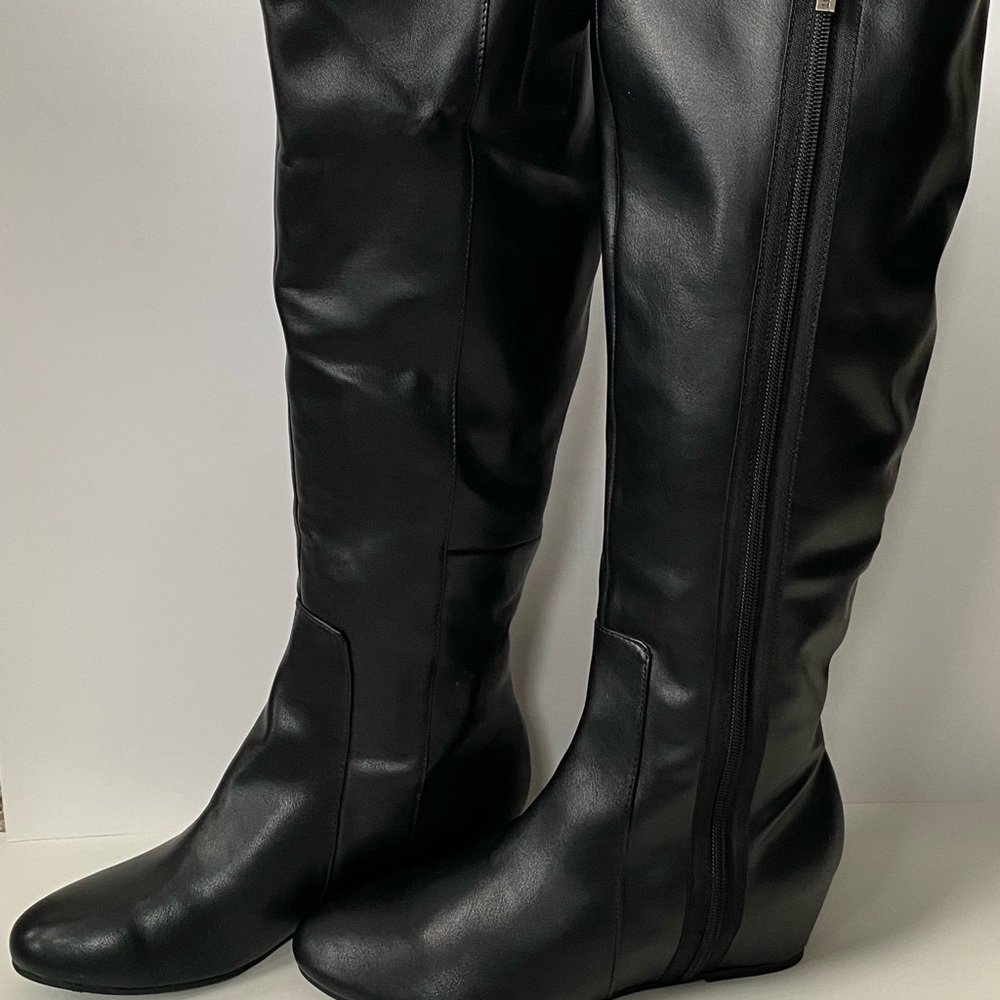 Black leather boots.